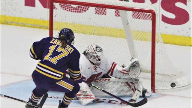 Wisconsin goaltender Jane Gervais stops a shot by Minnesota State's Lauren Zawoyski (17) during the second period at LaBahn Arena in Madison, Wisconsin on Thursday Oct. 12, 2023.